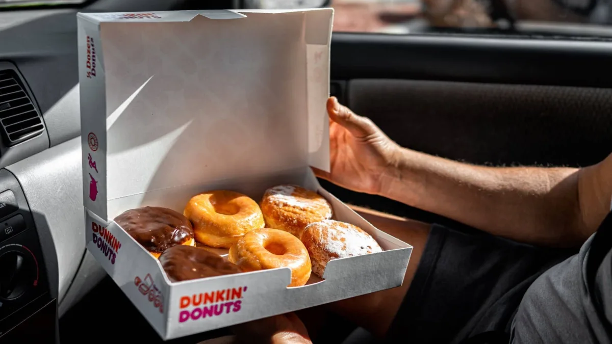 Dunkin' sign outside a restaurant