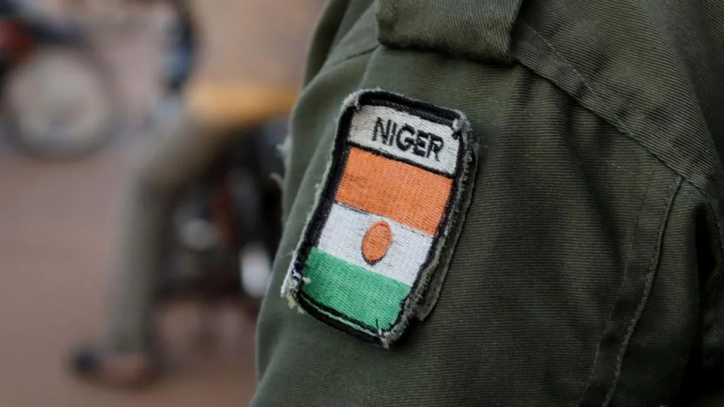 Security forces near Niger's presidential palace in Niamey after a coup attempt