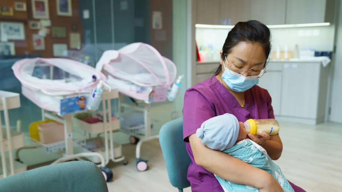 Singapore skyline with a family policy headline about fertility support