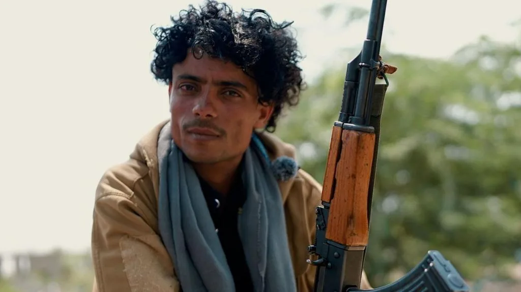 Smoke rises near the front line outside Taiz, Yemen