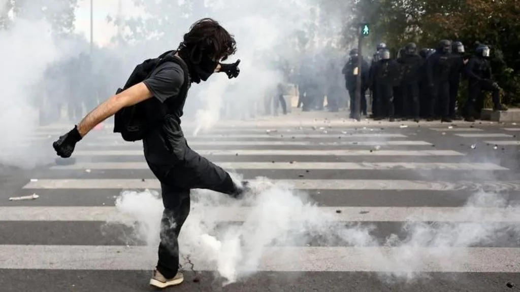 Students and police during school protests in France