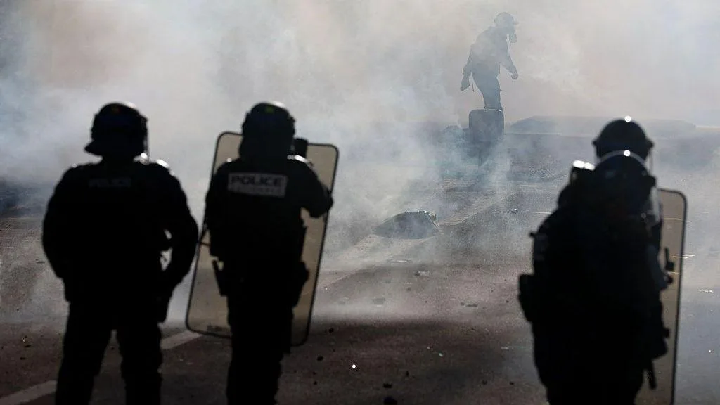 Police and students during a school protest in Lens, France