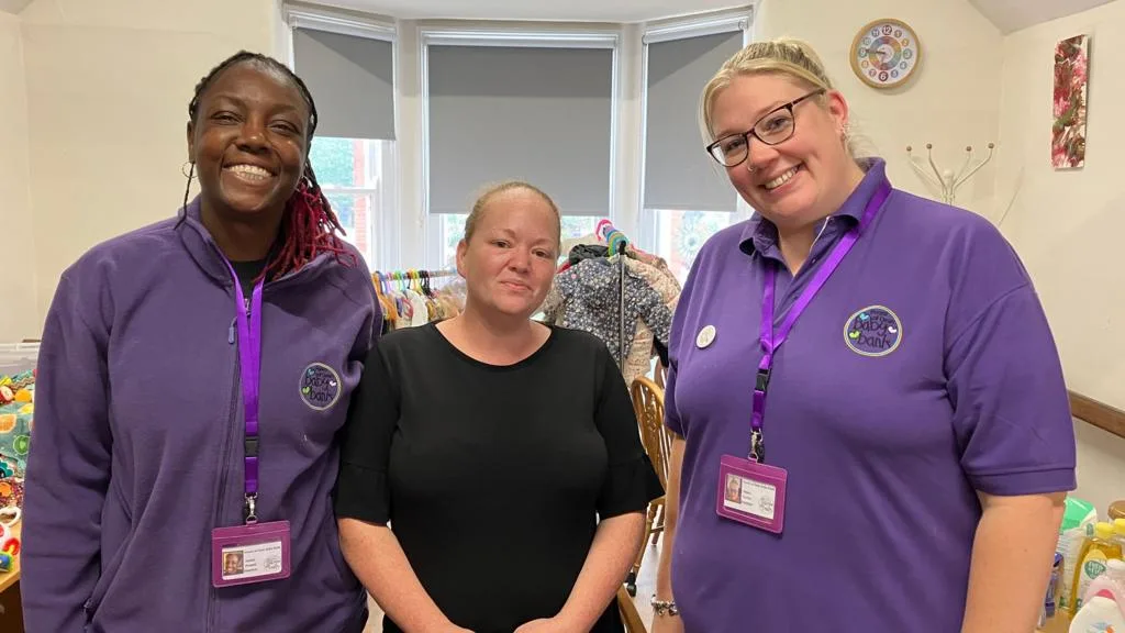 Volunteers at a baby bank in Newent handing out free baby items