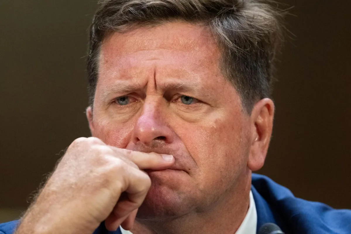 Jay Clayton speaking at an event as SEC crypto enforcement is revisited