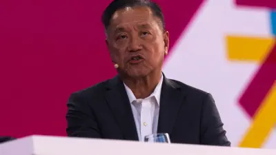 Broadcom logo and chart showing shares rising on AI demand