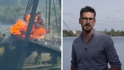 Damaged bridge crossing in Kyiv after Russian strikes